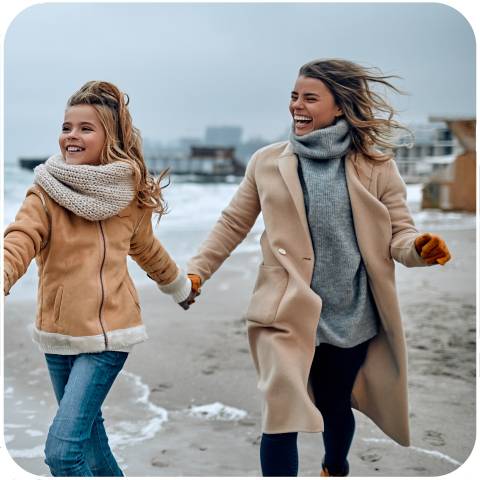 Glückliche Familie an einem Strand
